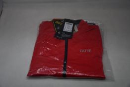 An as new Gore C5 Gore-Tex Active jacket in red (M).