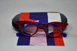 A pair of as new Anne & Valentin glasses frames with case.