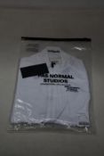 A women's as new Pas Normal Mechanism cycling jersey in white (M - RRP £155).