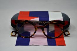 A pair of as new Anne & Valentin glasses frames with case.