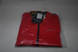An as new Gore C5 Gore-Tex Active jacket in red (M).