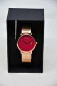 A women's as new Coluri Pankhurst watch in scarlet (RRP £139).