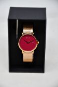 A women's as new Coluri Pankhurst watch in scarlet (RRP £139).