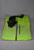 An as new Gore Gore-Tex Paclite jacket in neon yellow (L).