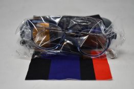 A pair of as new Anne & Valentin glasses frames with case.
