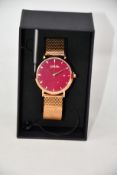 A women's as new Coluri Kahlo watch in scarlet (RRP £139).