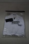 A women's as new Pas Normal Mechanism cycling jersey in white (XS - RRP £155).