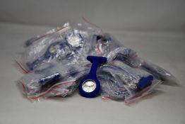Thirty as new Hosptrix nurses watches with blue silicon pin/strap.