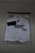 A women's as new Pas Normal Mechanism cycling jersey in white (M - RRP £155).
