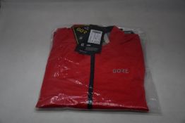 An as new Gore C5 Gore-Tex Active jacket in red (M).