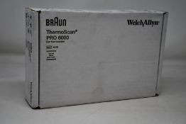 A Braun ThermoScan Pro 6000 ear thermometer.