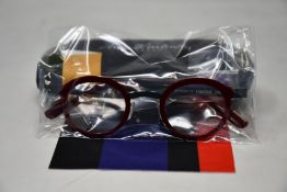 A pair of as new Anne & Valentin glasses frames with case.
