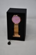 A women's as new Coluri Kahlo watch in rose (RRP £139).