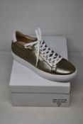 A pair of as new Guinea Camden bronze low top trainers (EU 41).