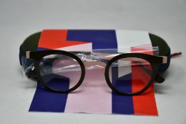 A pair of as new Anne & Valentin glasses frames with case.