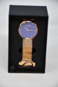 A women's as new Coluri Kahlo watch in violet (RRP £139).