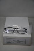 Twelve pairs of as new B Ultem H66003 glasses frames.