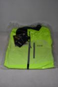 An as new Gore Gore-Tex Paclite jacket in neon yellow (L).
