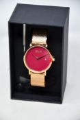 A women's as new Coluri Pankhurst watch in scarlet (RRP £139).