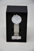 A women's as new Coluri Kahlo watch in snow (RRP £139).