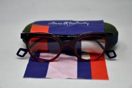 A pair of as new Anne & Valentin glasses frames with case.
