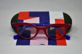 A pair of as new Anne & Valentin glasses frames with case.