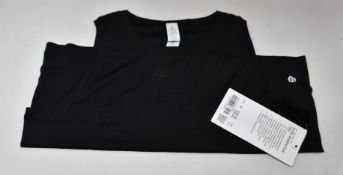 Five as new LuluLemon Swiftly Breathe crop tanks (Sizes 2 x 4, 2 x 6, 1 x 8 - RRP £45 each).