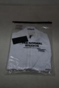 A women's as new Pas Normal Mechanism cycling jersey in white (XS - RRP £155).
