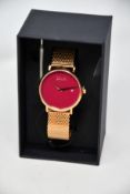 A women's as new Coluri Pankhurst watch in scarlet (RRP £139).