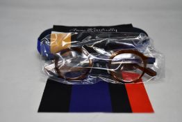 A pair of as new Anne & Valentin glasses frames with case.