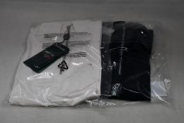 Three women's as new Chervo Trip golf tops (All UK 12).