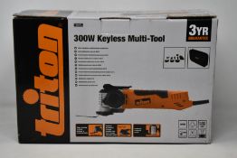 A boxed as new Triton TMUTL 300W Keyless Multi-Tool.