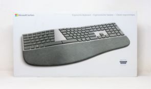 A boxed as new Microsoft Surface Ergonomic Keyboard in Grey (M/N: 3RA-00003) (UK Englight layout.