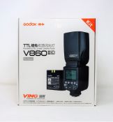 A boxed as new Godox VING V860IIC TTL Li-Ion Flash Kit for Canon Cameras (Box opened. Two pin plug