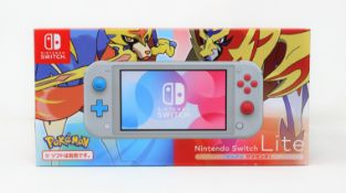 A boxed as new Nintendo Switch Lite Zacian and Zamazenta Pokemon Edition (M/N: HDH-S-GBZAA-JPN) (
