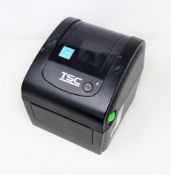 A pre-owned TSC DA200 Desktop Direct Thermal Barcode Printer (Power supply included) (Tested,