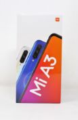 A boxed as new Xiaomi Mi A3 4GB/64GB in More Than White (Box sealed. Two pin plug).