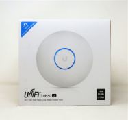 A boxed as new Ubiquiti UniFi UAP-AC-LR Long Range Indoor Access Point (EU model. Box sealed).