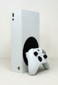 A pre-owned Xbox Series S games console in white (controller included) (no cables).