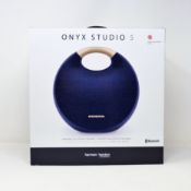A boxed as new Harman Kardon Onyx Studio 5 Portable Bluetooth Speaker in Blue (Box sealed).