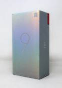 A boxed as new Xiaomi Mi 9 6GB/128GB Global Edition in Piano Black (Box sealed. Two pin plug).