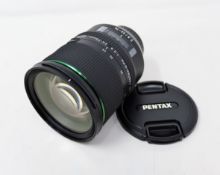 A boxed as new Rioch Pentax 24-70mm f/2.8ED HD Pentax-D FA SDM WR Lens (Box damaged, opened to check
