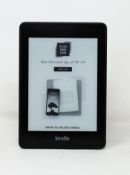 A pre-owned Kindle Paperwhite (10th Generation) in Black.