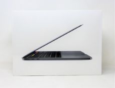 A boxed as new Apple MacBook Pro 13