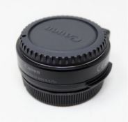 A boxed as new Canon EF-EOS R 0.71x Mount Adapter.