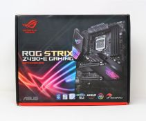 A pre-owned ASUS ROG Strix Z490-E Gaming Motherboard (P/N: 90MB12P0-M0EAY0) (Boxed. Untested, sold