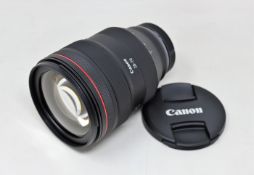 A boxed as new Canon RF 28-70mm F2L USM Lens with Lens Case and Lens Hood.
