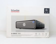 A boxed as new SanDisk Professional G-DRIVE PRO 6TB USB-C Desktop Hard Drive (Box sealed, slight