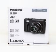 A boxed as new Panasonic Lumix DMC TZ90 Digital Camera in Silver (Packaging states 'for Oceania