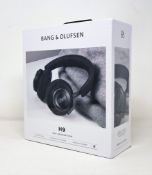 A boxed as new pair of Bang & Olufsen H9 3rd generation headphones in black.